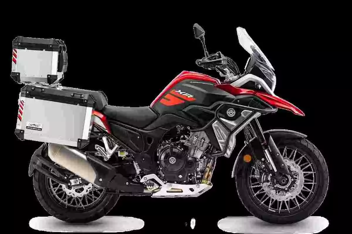 Red and black touring motorcycle equipped with aluminum side and rear cases on a black background Red and black touring motorcycle equipped with aluminum side and rear cases on a black background