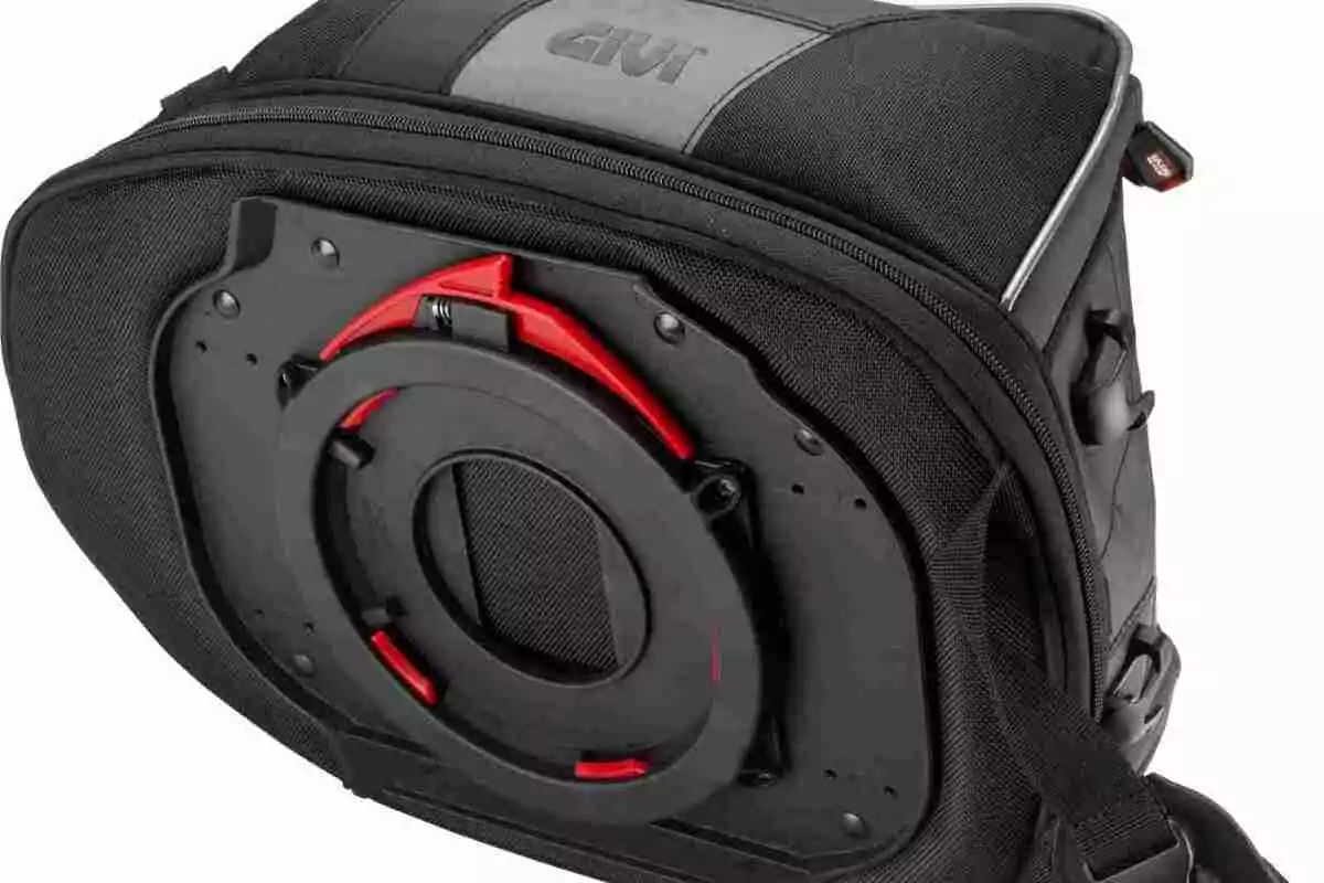 Black motorcycle bag with quick-release base mounting system and red accents Black motorcycle bag with quick-release base mounting system and red accents