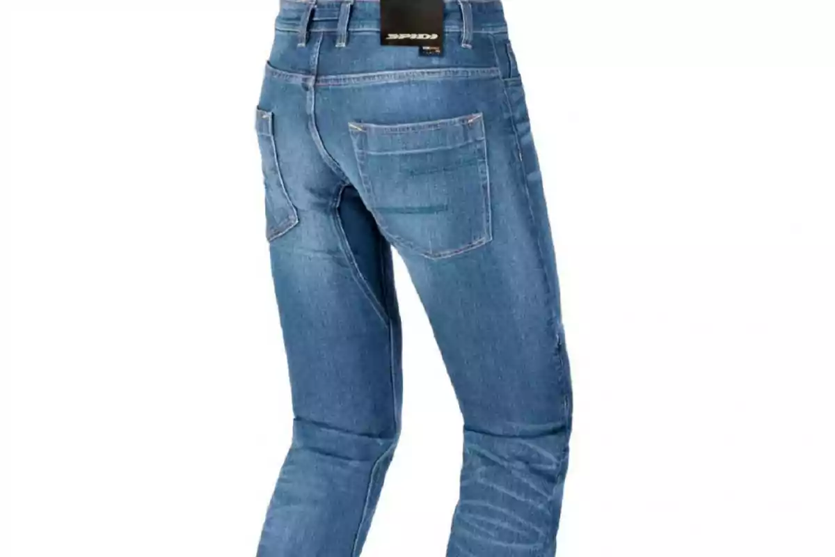 Persona usando pantalones de mezclilla azules vista desde atrás Persona usando pantalones de mezclilla azules vista desde atrás